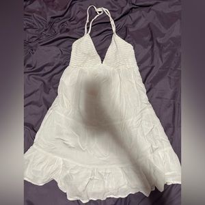 White dress with cross and tie back